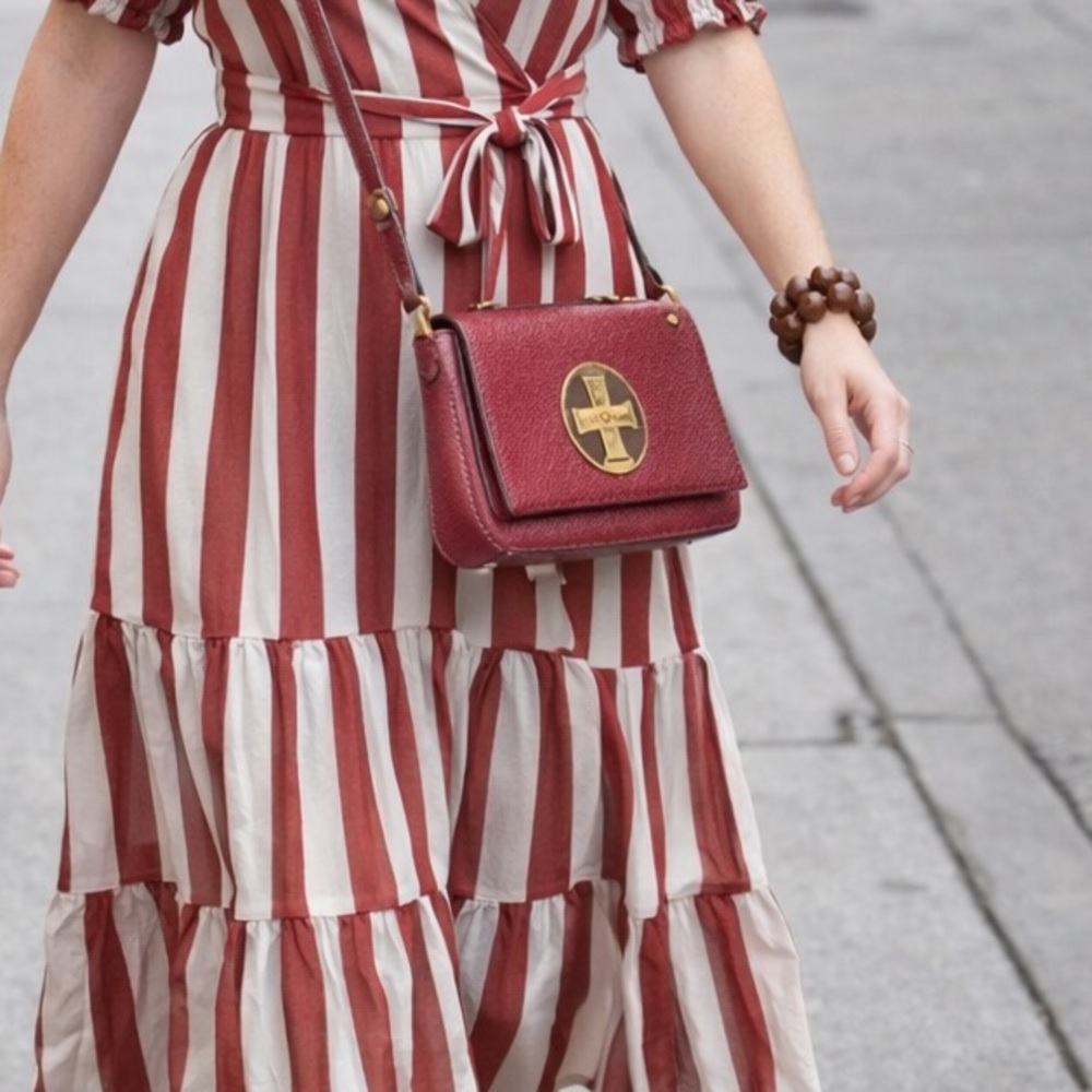 Kate Spade burgundy red simple crossbody with gold accents